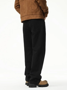 Men's loose straight-leg black denim jeans shown from a rear view in a minimalist style