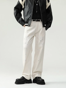 Off-white straight-leg cotton jeans for men with ink splatter and distressed details