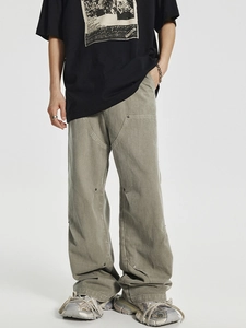 Men's relaxed fit vintage workwear trousers with reinforced knee panels and rivets