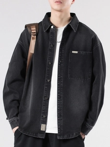 Men's retro washed black denim jacket with chest pockets and casual layering style