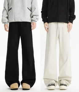 Detail comparison of black and off-white straight-leg casual cotton trousers