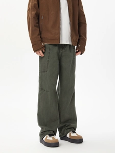 Olive green men's cargo pants in a loose fit with pockets and vintage washed texture