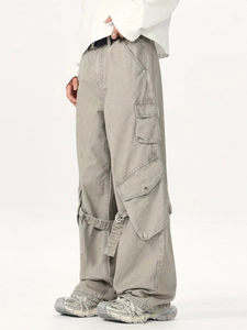 Sage green baggy cargo pants with multi-pockets and utility straps in vintage style