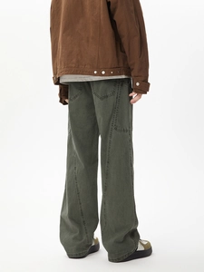 Detail view showing back pockets and stitching on men's vintage washed cargo pants
