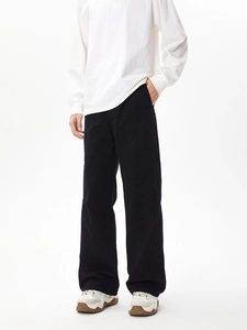 Detailed close-up of men's black straight-leg cargo pants with pockets in a washed finish