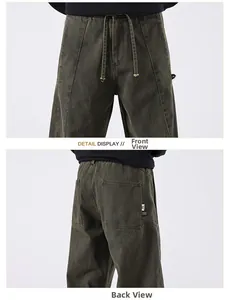 Detail view of the drawstring waist and reinforced rear pockets on heavy utility pants