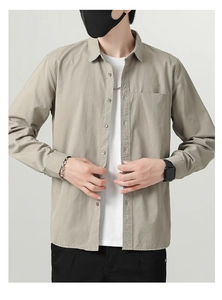 Close-up of casual cotton long-sleeve shirt with lapel collar and chest pocket detail