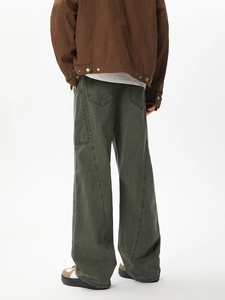 Rear view of washed olive cargo pants showing stitching detail and large back pockets