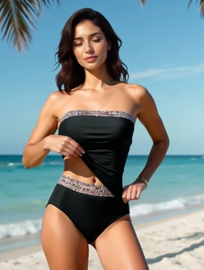 Detail of high-waisted black bikini bottoms with leopard print side cut-outs