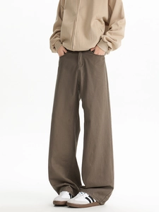 Deep brown wide-leg twill trousers in a clean straight fit styled with a khaki jacket