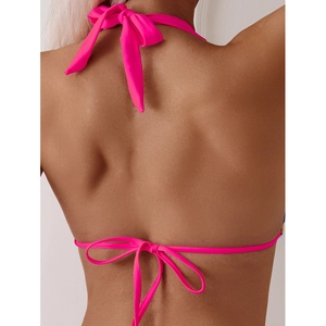 Hot pink string bikini top with neck and back ties shown from a back view on a model