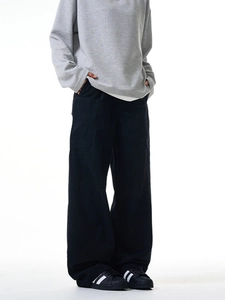 Men's faded black multi-pocket cargo pants in a cleanfit wide-leg streetwear style