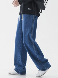 Jean bleu clair pour homme coupe large droite avec cordon de serrage à la taille