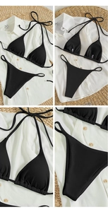 Detail view of black textured ribbed bikini set with halter ties on woven mat