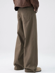 Men's loose wide-leg dark brown twill trousers with vintage workwear style back view