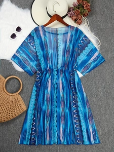 Blue tribal print beach cover-up with tie waist and light mesh fabric for women