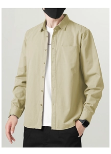 Detail view of khaki cotton long-sleeve casual shirt with chest pocket and classic collar