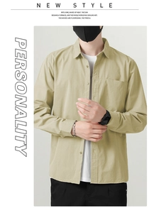 Detail of light khaki long-sleeve cotton jacket with chest pocket and button-up front