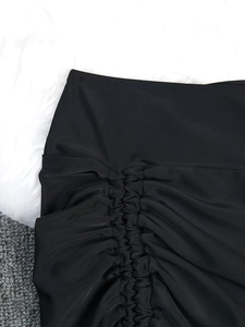 Plus size black high waisted swim shorts for women with side ruched drawstring detail