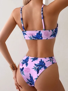 Rear view of lavender tropical print bikini featuring high waisted and high cut bottoms