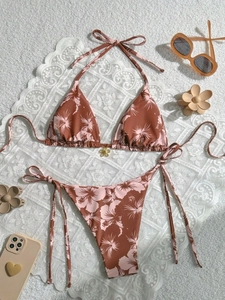 Tropical floral print two-piece bikini set with halter top and side tie bottom