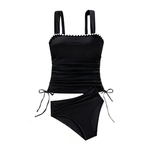 Detail of black two-piece swimsuit featuring ruffled trim square neck and side drawstrings