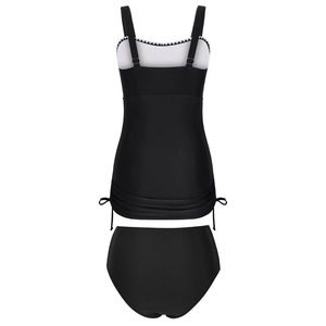 Detail of black tankini swim top featuring adjustable straps and drawstring side design