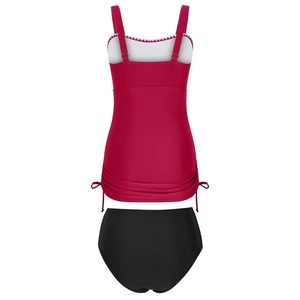 Close-up of red tankini top with white scalloped trim and side drawstring details