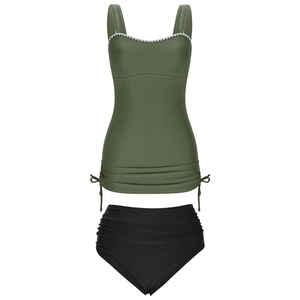Detail of army green tankini top with white scalloped trim and drawstring side ties