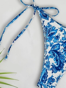 Women's floral bikini top featuring blue paisley pattern and adjustable tie strings