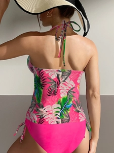 Women's backless tankini swimsuit with tropical floral print and halter neck ties