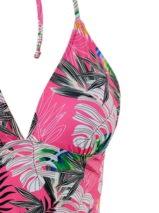 Detailed view of pink tropical palm leaf print and halter neck tie on the bikini top