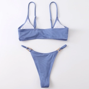 Detail of lilac blue ribbed bikini with adjustable straps and gold metal side buckles