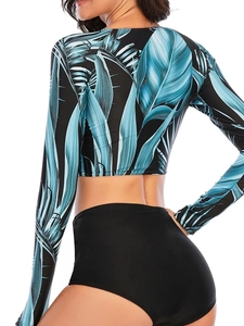 Women's two-piece long sleeve surfing swimsuit with tropical palm leaf print
