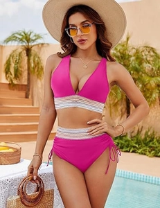 Detail of high waisted bikini bottom with side drawstring and colorful wave trim