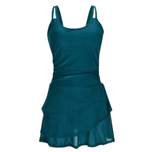 Dark teal backless one-piece swimsuit dress with triple layered ruffle skirt and pleats