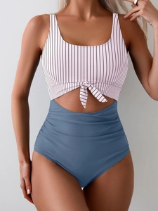 One-piece swimsuit with striped tie-front top and blue high-waisted ruched bottom