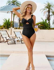 Detailed view of the stylish twist-knot design and keyhole cutout on this black swimsuit