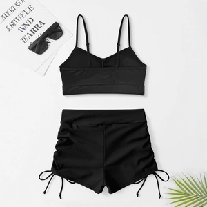 Solid black two-piece bikini set with drawstring high-waisted shorts and thin strap top