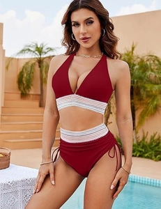 Detail of burgundy bikini with V-neck halter top and high-waisted drawstring bottoms