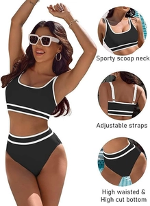 Dettagli del bikini sportivo nero con bordi a contrasto bianchi e spalline