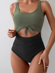 Front view of a cut-out one-piece swimsuit with front knot and adjustable straps