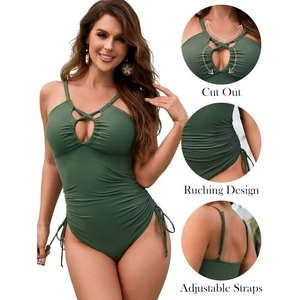 Close-up of dark green swimsuit featuring cut-out chest and adjustable shoulder straps