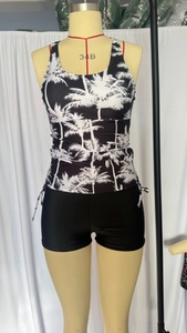 Macro detail of tropical palm print on tankini top with side drawstring design