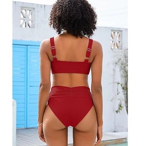 Rear view of red ruched bikini with high-waisted bottom and ribbed fabric detail