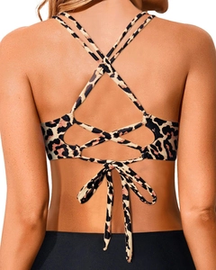 Detailed back view of a leopard print bikini top featuring crisscross lace-up straps