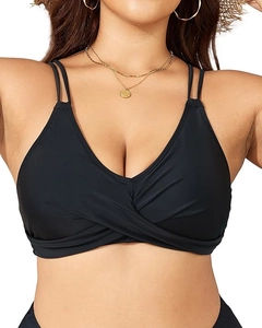 Close-up of black bikini top with crisscross straps and textured matte fabric details