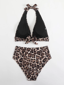 Detailed flat lay of leopard print bikini top with halter neck ties and high waist bottom