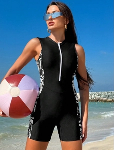 Close-up of women's one-piece surfing swimsuit with front zipper and side patterns
