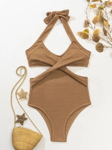 Brown halter neck one-piece swimsuit with textured fabric and stylish cutout design